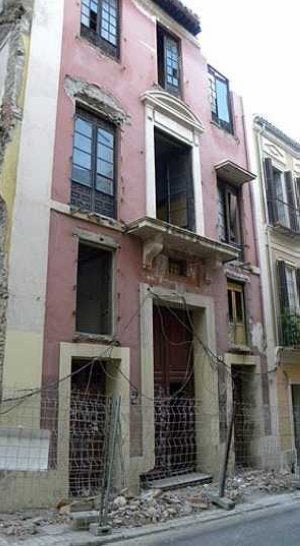 La fachada, poco antes de su demolición. :: WEB MALAGA MONUMENTAL/